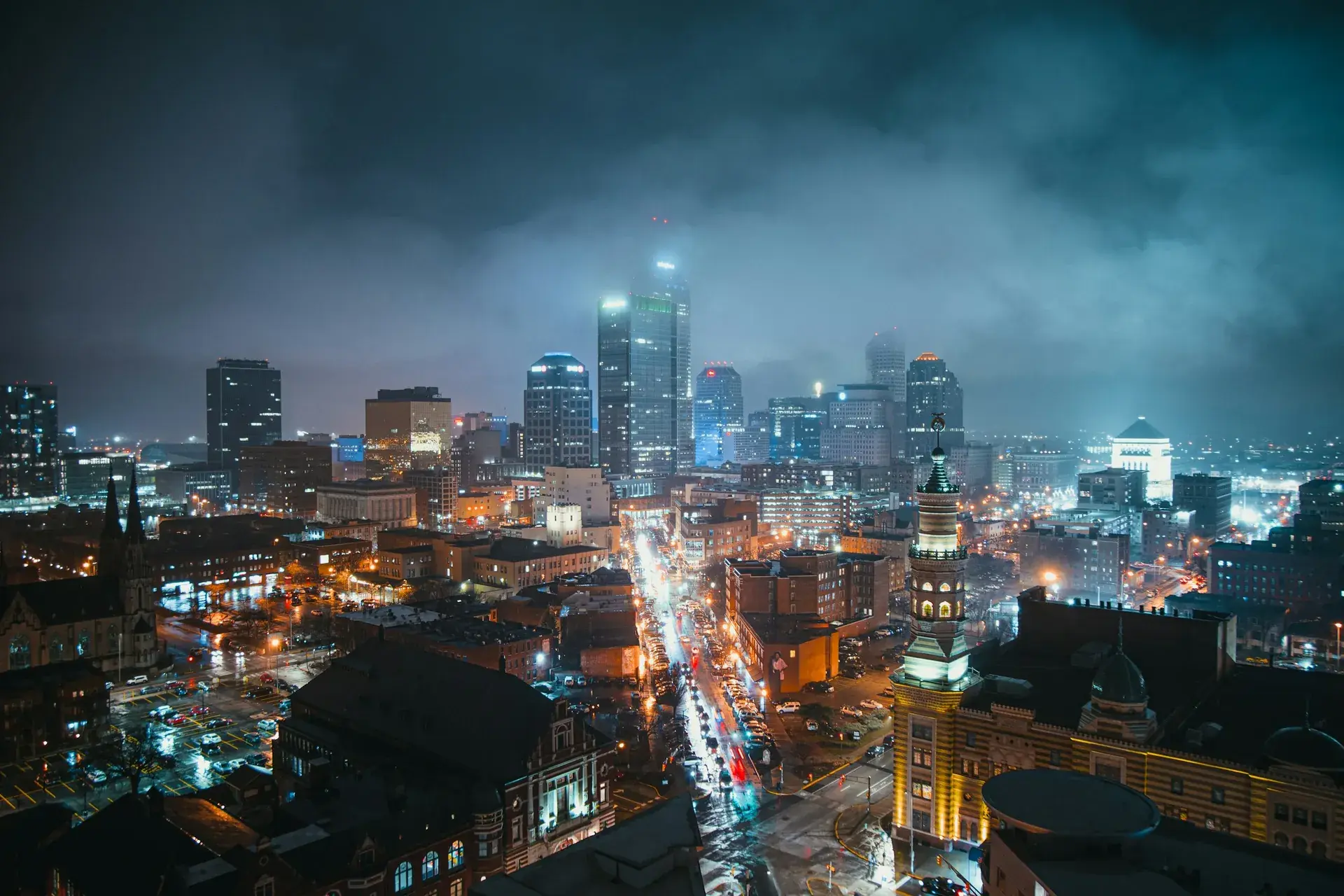 Aerial view of downtown Indianapolis, Indiana, lit up at dusk